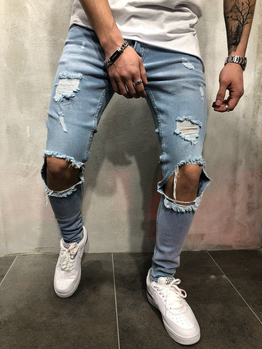 Blue Ripped Knee Out Skinny Jeans Men's Luxury Boutique X9X™